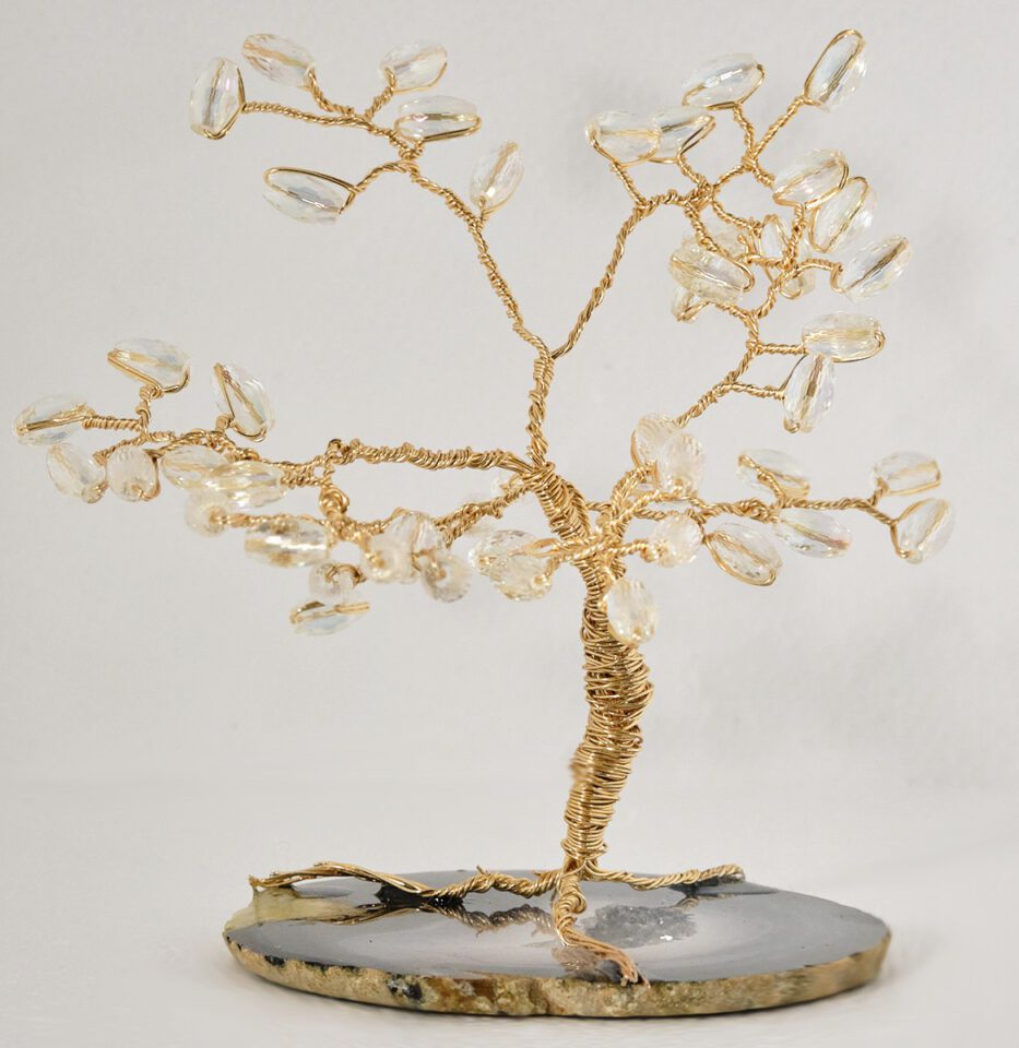 4" Wire Tree with Gold Wire and Crystal Oval Glass Beads on a slice of Blue colored agate
